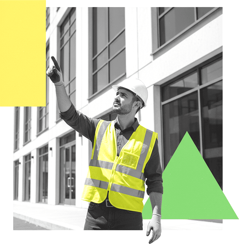 Building inspector examining a commercial construction site exterior