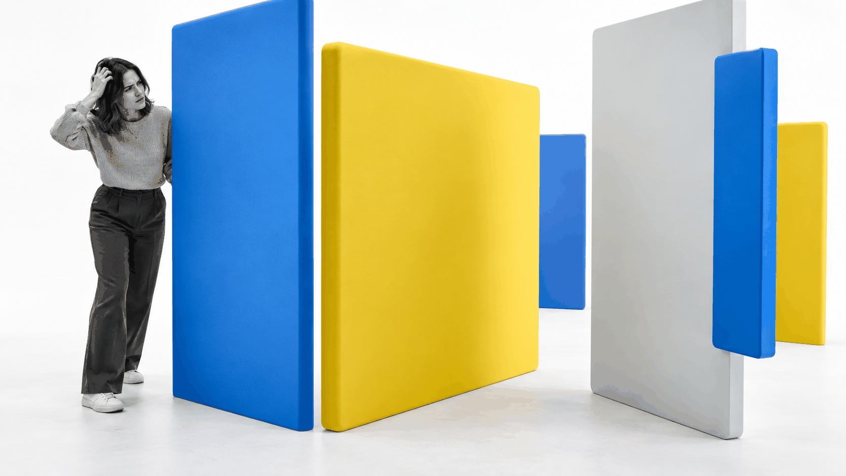 User navigating oversized physical panels that represent Windows 8 usability problems