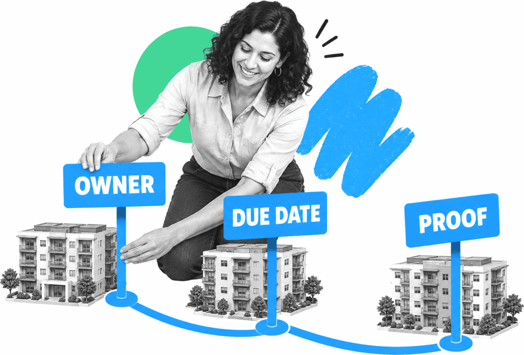 A property operations manager reviewing labeled workflow markers beside a row of buildings.
